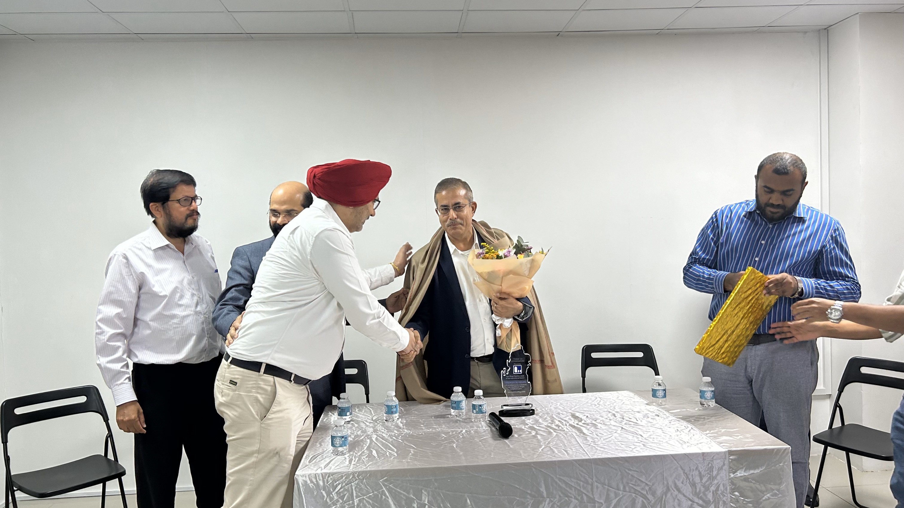 Mr. Iqbal Singh